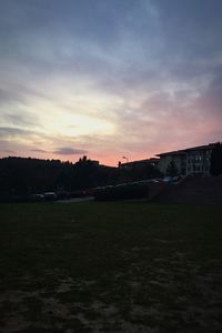 Scenic view of landscape against sky at sunset