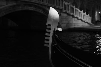 Close-up of arch bridge over river