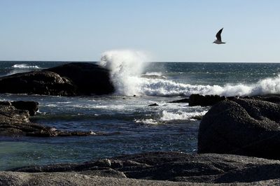 Waves splashing on rocks