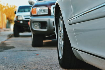 Close-up of car on street