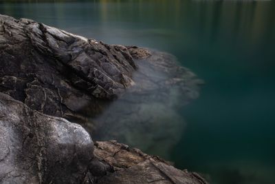 Close-up of a rock in water