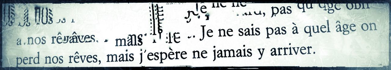 Close-up of text on wall