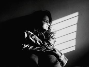 Close-up of young woman sitting