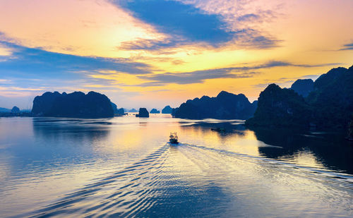 Scenic view of sea against sky during sunset