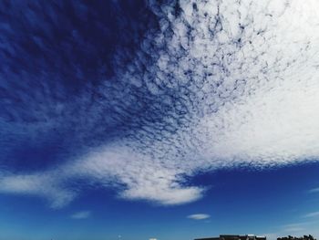 Low angle view of cloudscape against blue sky