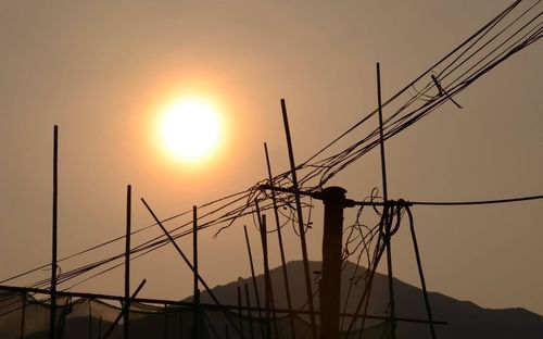 Low angle view of silhouette trees at sunset