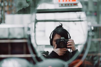 Close-up of woman photographing