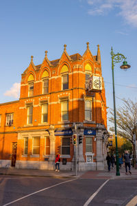 Group of people in front of building
