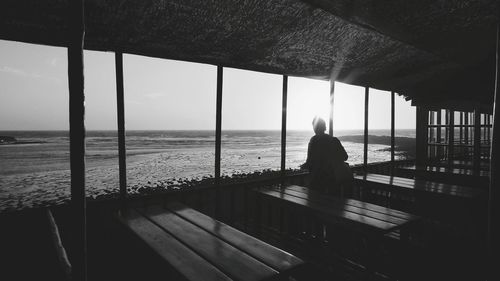 Man standing against sea