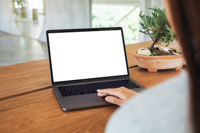 Close-up of laptop on table