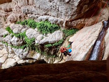 Man climbing on rock