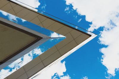 Low angle view of built structure against blue sky