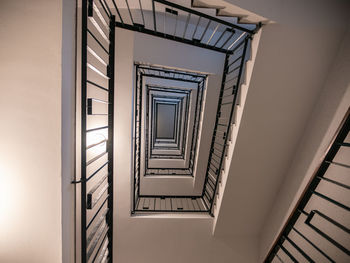 Low angle view of spiral staircase in building