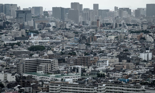 High angle view of modern buildings in city