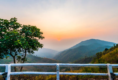 Scenic view of mountains against sky during sunset