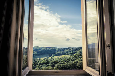 Mountains seen through window