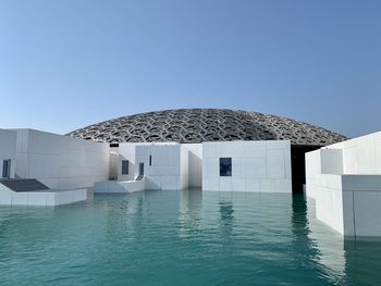 Abu dhabi louvre between the sky and the sea