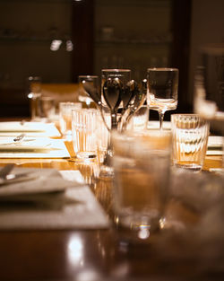 Close-up of wineglasses on table