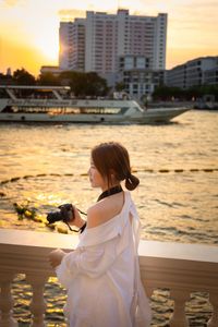 Rear view of woman looking at sea