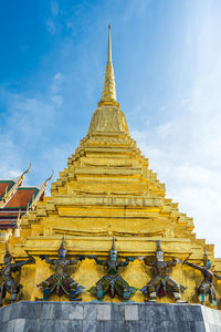 Low angle view of temple against building