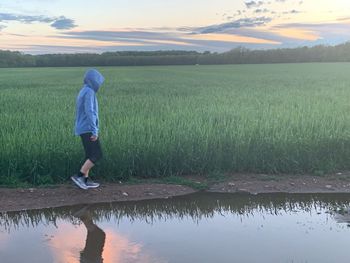 Full length of man on field against sky