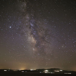 Low angle view of stars in sky at night