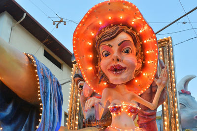 Low angle view of illuminated carousel