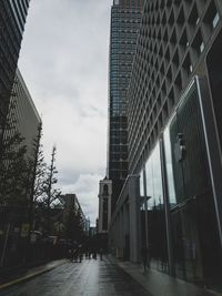 Low angle view of modern buildings against sky