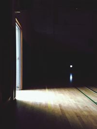 Empty underground walkway at night