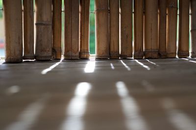 Close-up of pipes on floor in building