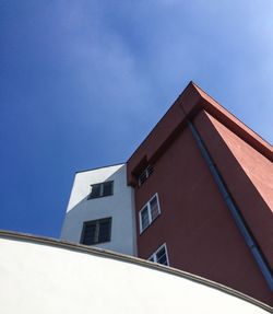 Low angle view of built structure against blue sky