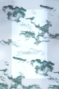 Digital composite image of trees against sky