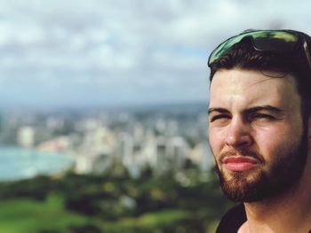 Portrait of young man looking away