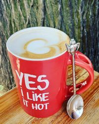 Close-up of coffee cup on table