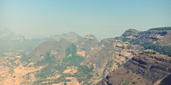 High angle view of mountains against clear sky