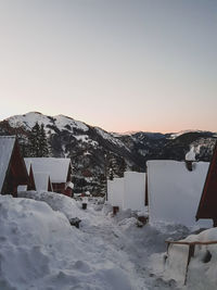Snowcapped mountains against clear sky