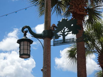 Low angle view of street light against sky