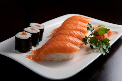 Close-up of sushi served on table