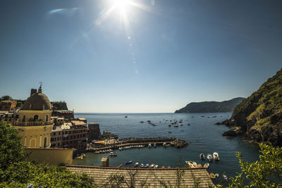 Buildings by sea against sky at cinque terre