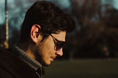 Close-up of young man wearing sunglasses