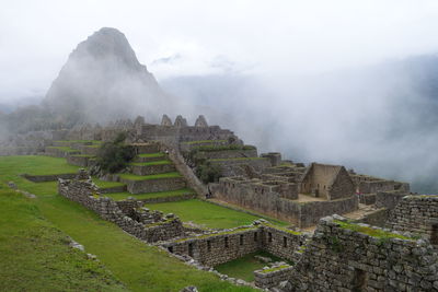 Panoramic view of old ruins against sky