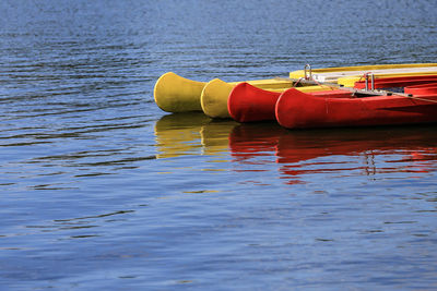 Kayaks floating on water