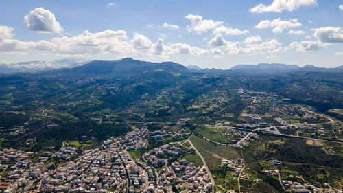 Aerial view of townscape against sky