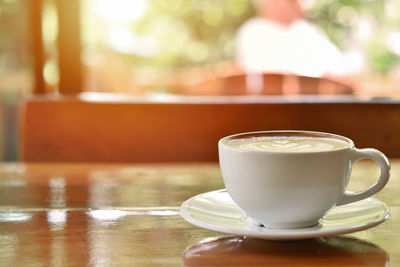 Close-up of coffee served on table