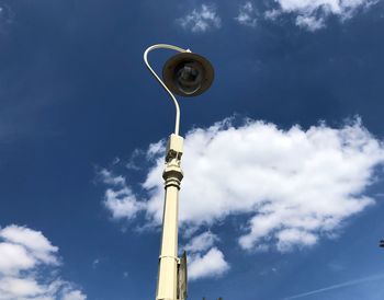 Low angle view of street light against sky