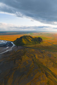 Scenic view of landscape against sky during sunset