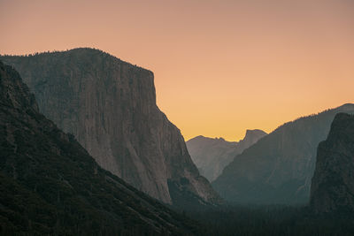 Scenic view of mountains against sky during sunset