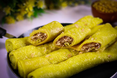 Close-up of green fruits in plate