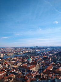 High angle view of townscape against blue sky