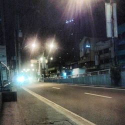 Illuminated street lights at night